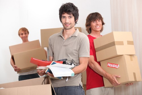 Packed boxes and furniture ready for local removals