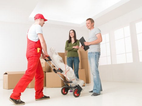 Transport vehicle and moving boxes representing a local removals service agreement