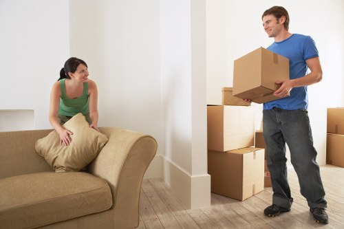 Careful loading of student belongings into a removals van
